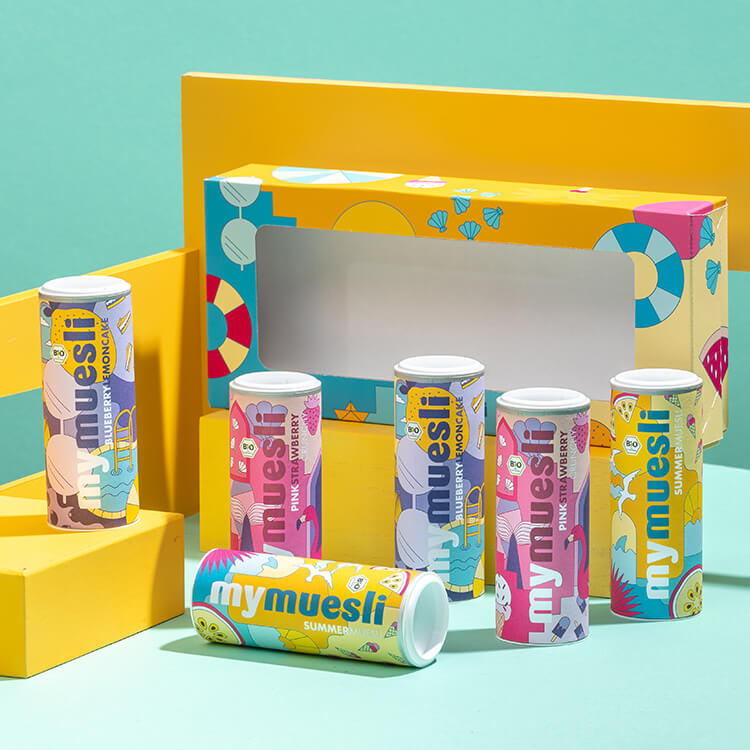 Sechs mymuesli Sommer Muesli Mini Dosen in der einer bunten Geschenkbox