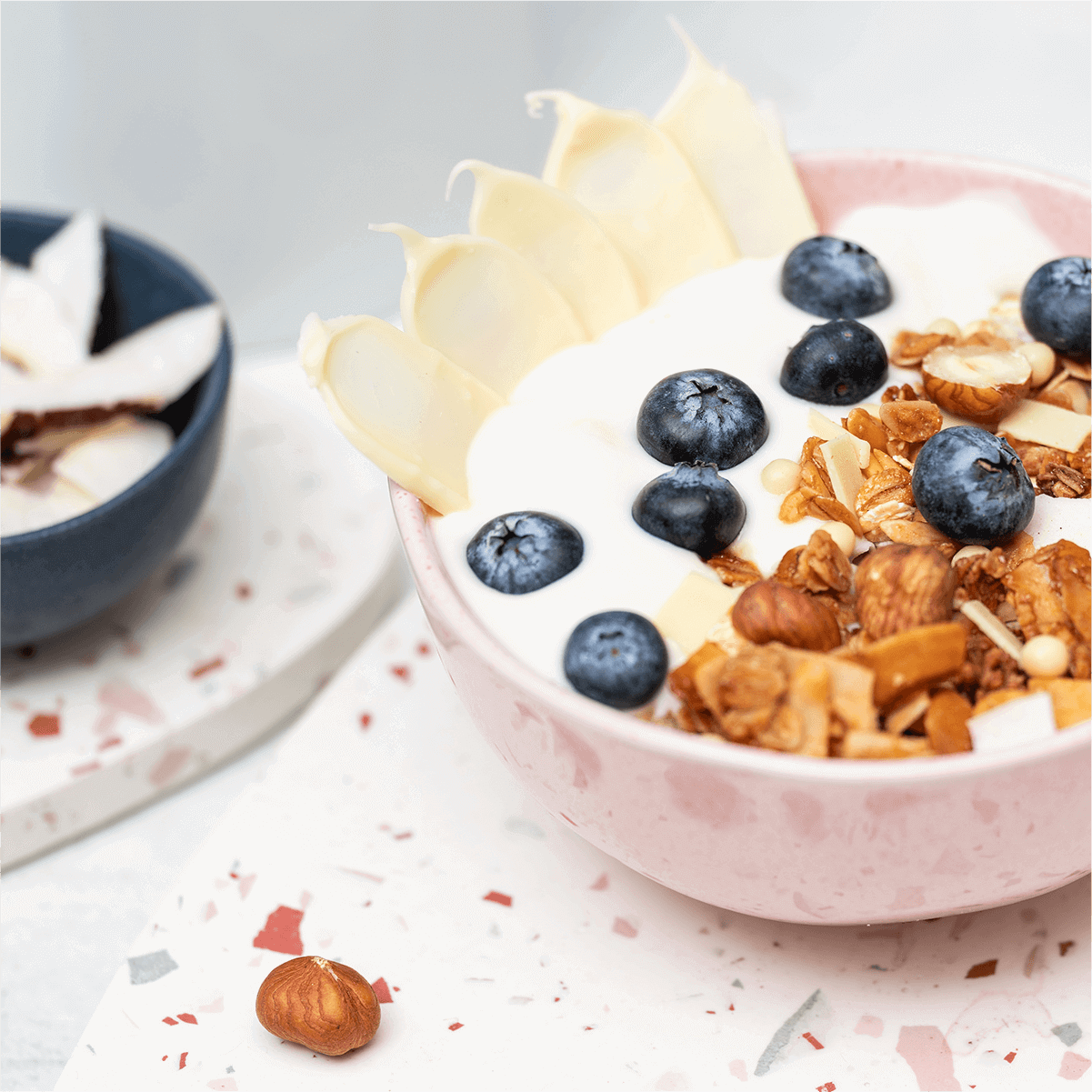 Limited Edition mymuesli x Nina Clausonet White Chocolate Almond Hazelnut Granola with yoghurt and fresh blueberries