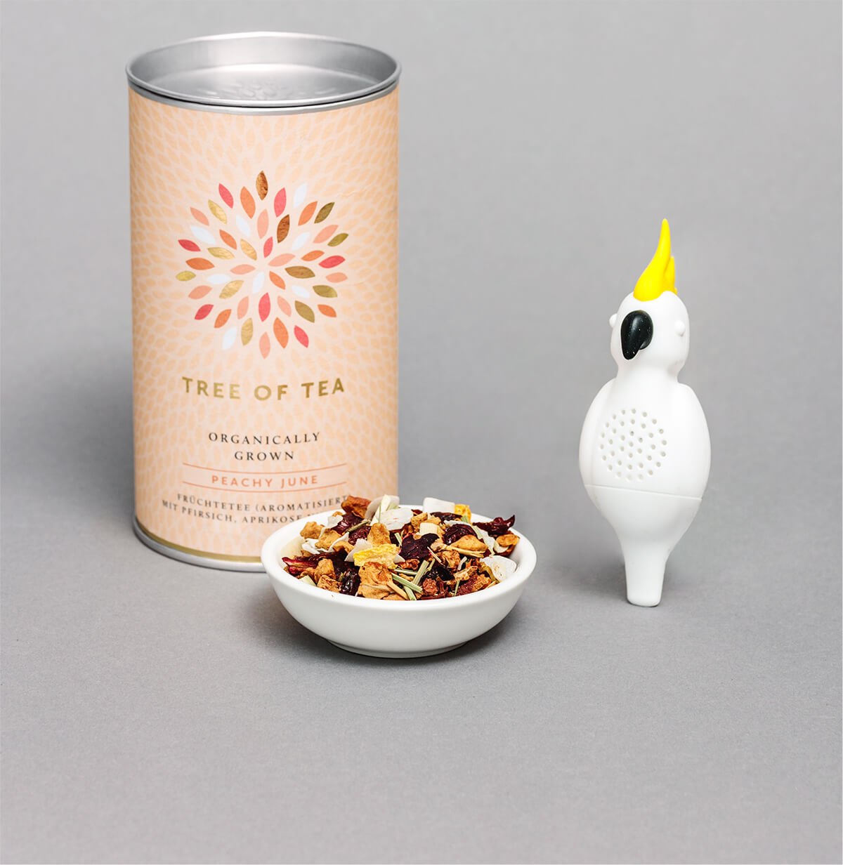 Kakadu Teesieb im Set mit dem Peachy June Sommertee